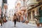 woman walking in balat turkey full of colorful house