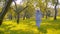 Woman walking barefoot on the grass