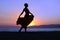 Woman walking on the beach