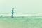 Woman walking beach tidal pool ocean