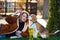 Woman walking with beagle puppy in backyard