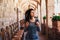 Woman walking in corridor in old medieval castle