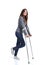 Woman walking with crutches