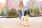 Woman walking English Springer Spaniel dog