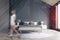 Woman walking in gray attic bedroom