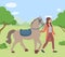 Woman walking with horse in park, summertime. Smiling female rider going with stallion outdoor