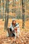 Woman walking with husky dog autumn forest. Pedigree dog concept. Best friends. Unconditional love. Girl enjoy walk with