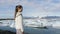 Woman walking Iceland nature landscape Jokulsarlon glacial lagoon glacier lake