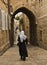 Woman Walking in the Old City, Jerusalem Israel