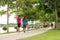 Woman walking in the park, exercise for healthy