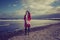 Woman walking on Portobello Beach, Edinburgh, Scotland