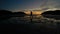 Woman Walking on Sandy beach on Pacific Ocean Coast View. Sunset Sky. San Josef Bay