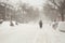 Woman walking in street covered of snow in Canada