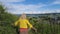 Woman walking in Swiss vineyards