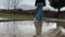 Woman Walking On Tip Toes, Water Reflections Rainy Gloomy Day