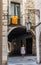 Woman walking under a Estelada flag in Girona. Spain.