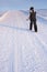 Woman Walking Uphill Snow Mountain Track