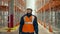 Woman walks on aisle looking at empty racks in storehouse