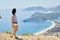 Woman walks along the Lycian Way trail. Fethiye, Oludeniz. Beautiful view of the sea and the beach. Hiking in the mountains of