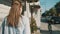 Woman walks along the street