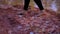 woman walks with bare feet on withered natural clay ground