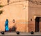 A woman walks on the streets of Marrakesh with the traditional Islamic dress, Morocco