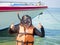 Woman warring snorkler on summer vacation