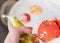 Woman washes fruit after shopping at the store. The concept of personal hygiene in detail, the fight against viruses and bacteria