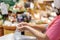 Woman washes her hands with clear alcohol gel bottle to prevent the spreading of the corona virus Covid-19 before entering the s