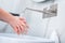 Woman washing hands with foam soap. Hygiene, preventing coronavirus