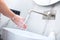 Woman washing hands with foam soap. Hygiene, preventing coronavirus