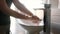 Woman Washing Her Hands In Bathroom, Close Up View