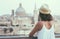 Woman watching the skyline of old Valletta city in Malta