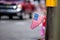 Woman Waving Small American Flag During Parade