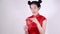 Woman wear cheongsam and open envelope in concept of happy chinese new year