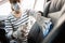 Woman wear protective glove,spraying alcohol antiseptic,disinfecting spray,cleaning on backrest,seat in car,protection during