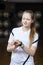 Woman Wearing Activity Tracker While Looking Away In Gym