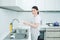 Woman wearing an apron , kitchen, cooking