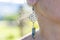 Woman wearing beautiful boho style earring