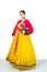 The woman wearing colorful Hanbok, Korean traditional dress on white background isolated.