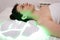 Woman is wearing cosmetic face photon mask. Health and beauty. Cosmetic procedure for woman face. Beauty laboratory. LED Facial