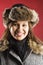 Woman wearing fur hat.