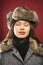 Woman wearing fur hat.