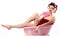 Woman wearing haircurlers relaxing in pink bathtub. Pinup styl