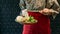 A woman wearing kimono holding cabbage over Sukiyaki vegetables set including cabbage, false pak choi, carrot, shiitake, enokitake