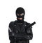 Woman wearing knitted balaclava with gun on white