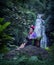 Woman wearing Laos traditional dress enjoy with nature portrait