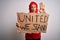 Woman wearing muslim hijab asking for union holding banner with united stand message with open hand doing stop sign with serious