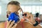 Woman wearing oxygen mask before exercise in fitness center