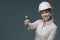 Woman wearing a safety helmet and giving a thumbs up